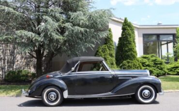 Unknown-220a-1954-Black-Red-1
