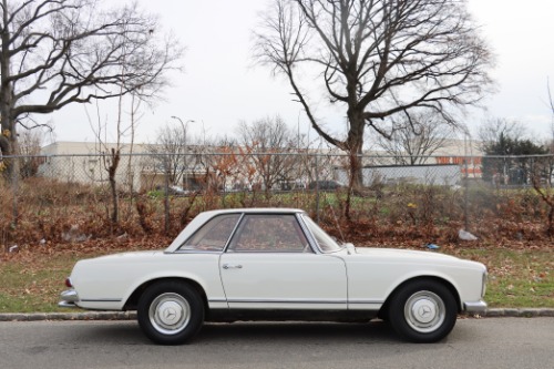 Unknown-230sl-1965-White-Red-1