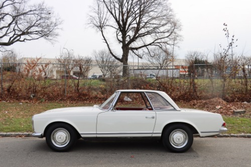 Unknown-230sl-1965-White-Red-2