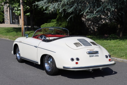 Unknown-356a-1957-White-RedBlack-5