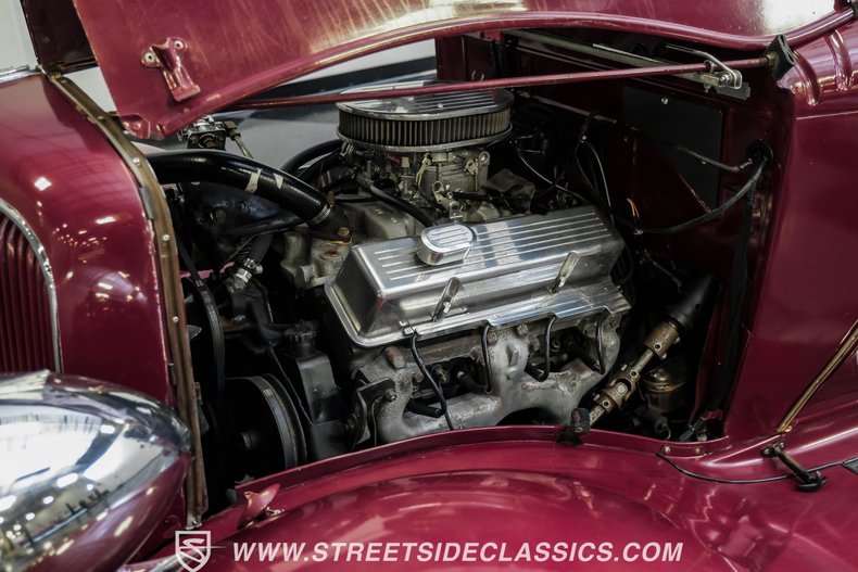 Unknown-4-door-1934-Maroon-Beige-1