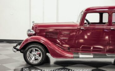Unknown-4-door-1934-Maroon-Beige-26