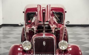 Unknown-4-door-1934-Maroon-Beige-34