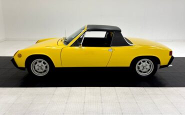 Unknown-914-1973-Saturn-Yellow-Black