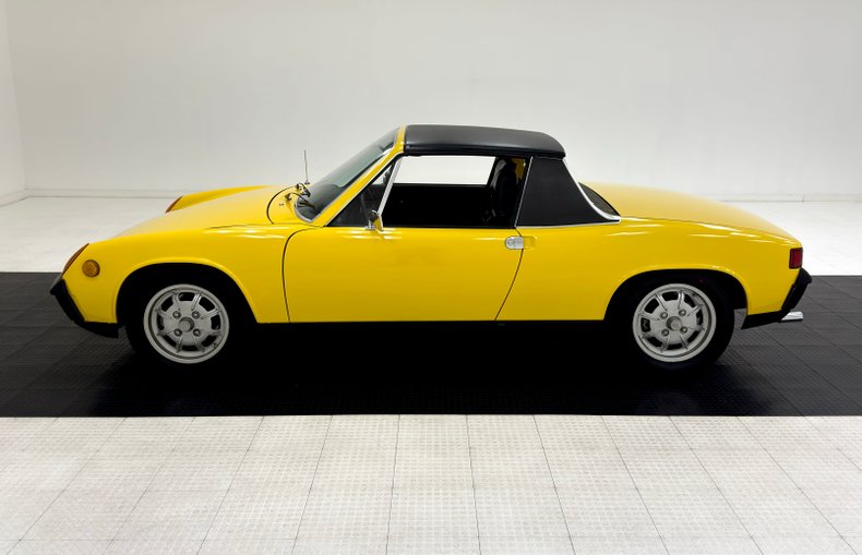 Unknown-914-1973-Saturn-Yellow-Black