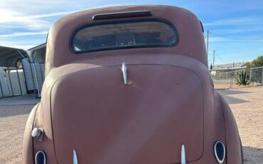 Unknown-A125-1949-Brown-4