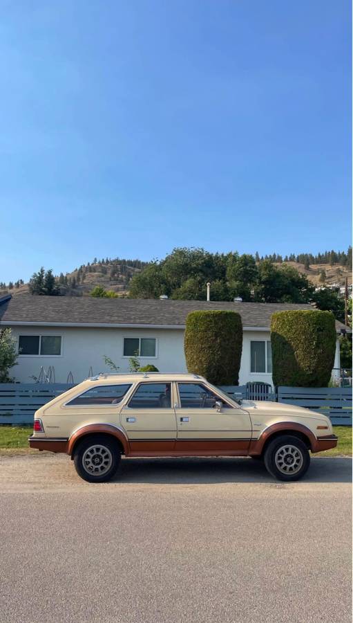 Unknown-American-motors-eagle-1982-yellow-1