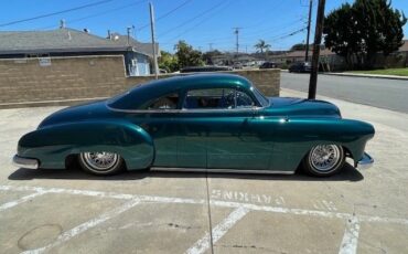 Unknown-Business-coupe-1949-jade-green-metalli-black-13