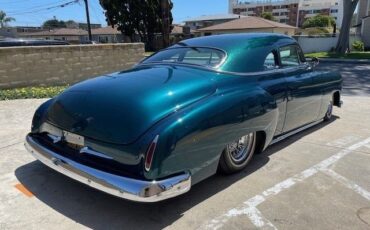 Unknown-Business-coupe-1949-jade-green-metalli-black-18