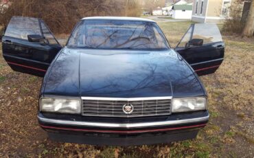 Unknown-Caddilac-allante-1989-black-1