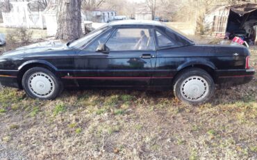Unknown-Caddilac-allante-1989-black-38