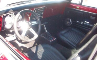 Unknown-Camaro-1967-Razzberry-Red-Pearl-Black-10