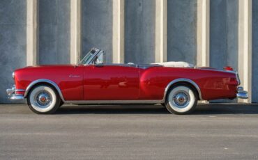 Unknown-Caribbean-1953-Matador-Maroon-Maroon-and-White-Lea-1