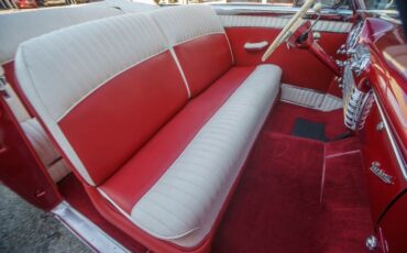 Unknown-Caribbean-1953-Matador-Maroon-Maroon-and-White-Lea-17