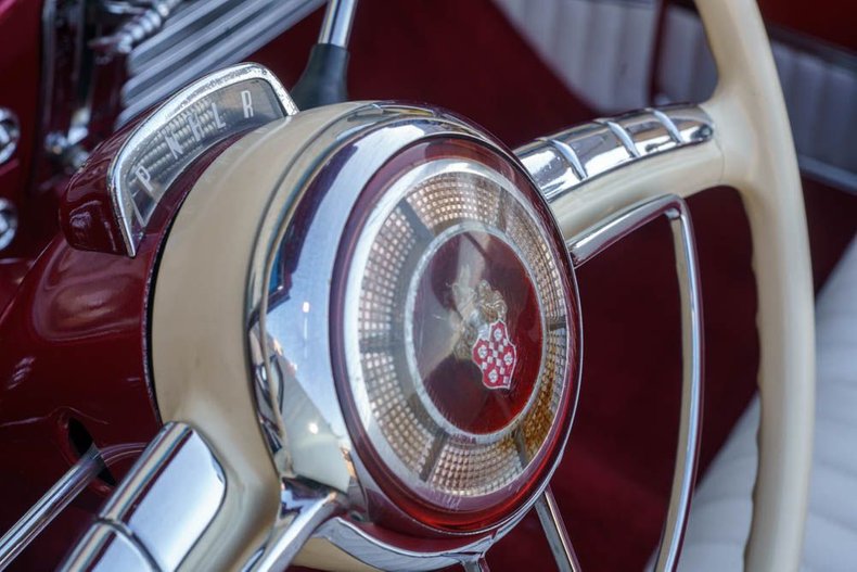 Unknown-Caribbean-1953-Matador-Maroon-Maroon-and-White-Lea-19