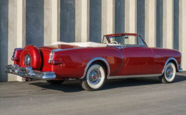 Unknown-Caribbean-1953-Matador-Maroon-Maroon-and-White-Lea-26
