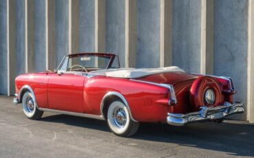 Unknown-Caribbean-1953-Matador-Maroon-Maroon-and-White-Lea-28