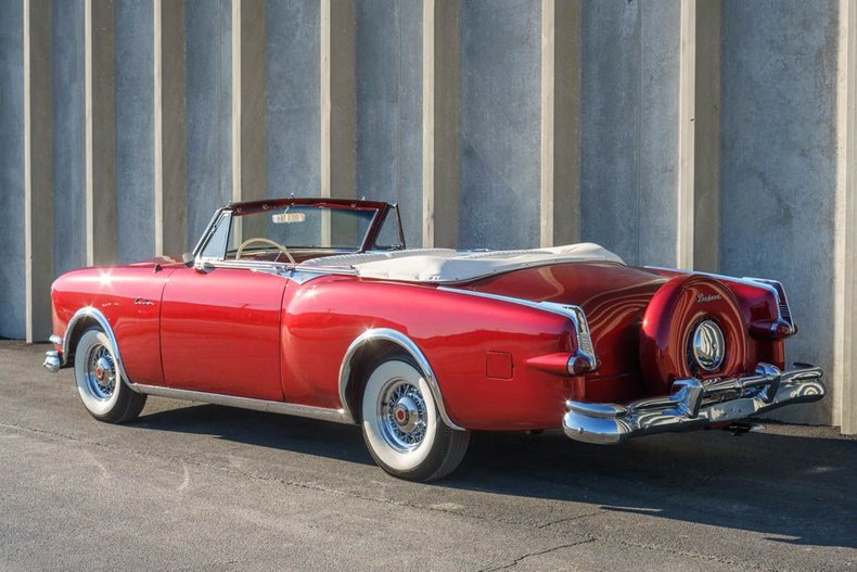 Unknown-Caribbean-1953-Matador-Maroon-Maroon-and-White-Lea-28