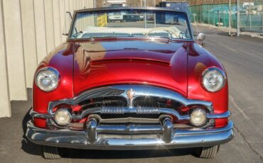 Unknown-Caribbean-1953-Matador-Maroon-Maroon-and-White-Lea-3