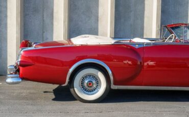 Unknown-Caribbean-1953-Matador-Maroon-Maroon-and-White-Lea-34