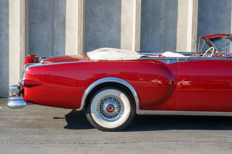 Unknown-Caribbean-1953-Matador-Maroon-Maroon-and-White-Lea-34