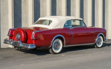 Unknown-Caribbean-1953-Matador-Maroon-Maroon-and-White-Lea-35