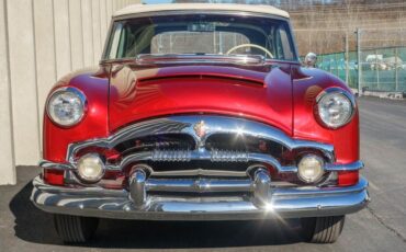 Unknown-Caribbean-1953-Matador-Maroon-Maroon-and-White-Lea-38
