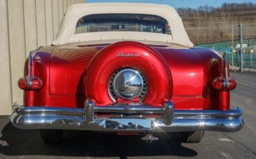 Unknown-Caribbean-1953-Matador-Maroon-Maroon-and-White-Lea-8