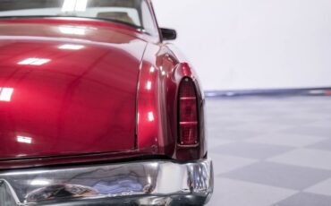 Unknown-Champion-1953-Candy-Red-Metallic-Tan-41