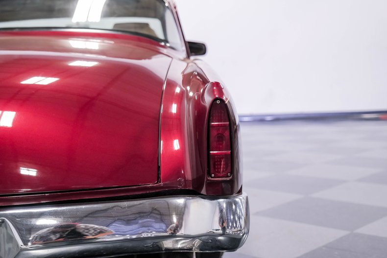 Unknown-Champion-1953-Candy-Red-Metallic-Tan-41