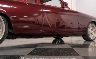 Unknown-Champion-1953-Candy-Red-Metallic-Tan-42