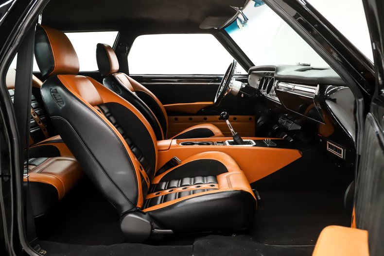 Unknown-Chevelle-1964-Ebony-Black-Saddle-47
