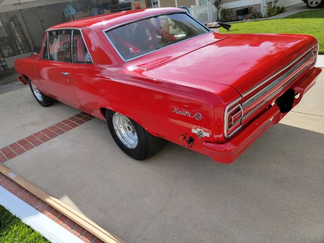 Unknown-Chevelle-1965-Red-7