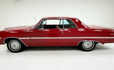 Unknown-Chevelle-1965-Regal-Red-Red