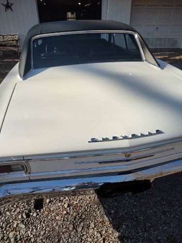 Unknown-Chevelle-1966-Pearl-WhiteBlack-Vi-1