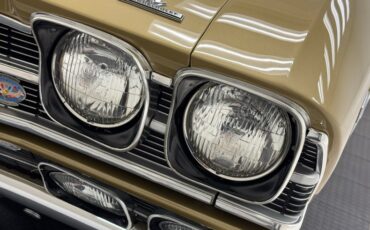 Unknown-Chevelle-1969-Olympic-Gold-Black-21