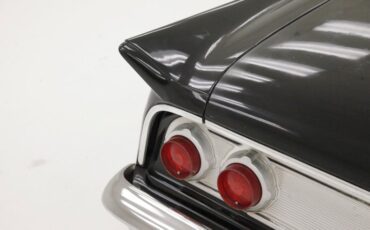 Unknown-Comet-1962-Black-Red-27