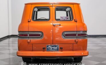 Unknown-Corvair-1962-Mango-Tango-Black-Houndstooth-10