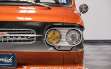 Unknown-Corvair-1962-Mango-Tango-Black-Houndstooth-14
