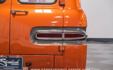 Unknown-Corvair-1962-Mango-Tango-Black-Houndstooth-15