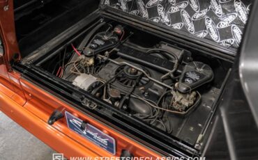 Unknown-Corvair-1962-Mango-Tango-Black-Houndstooth-16