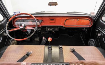 Unknown-Corvair-1962-Mango-Tango-Black-Houndstooth-26