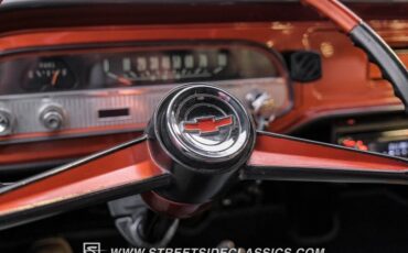 Unknown-Corvair-1962-Mango-Tango-Black-Houndstooth-35