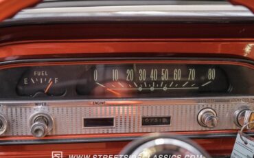 Unknown-Corvair-1962-Mango-Tango-Black-Houndstooth-37