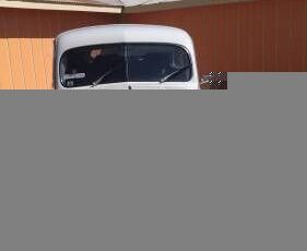 Unknown-Corvair-1962-Mango-Tango-Black-Houndstooth-4