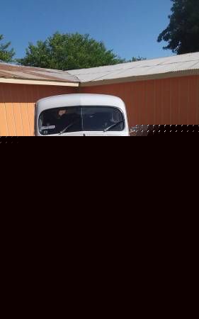 Unknown-Corvair-1962-Mango-Tango-Black-Houndstooth-4