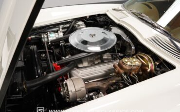 Unknown-Corvette-1964-Ermine-White-Saddle-1
