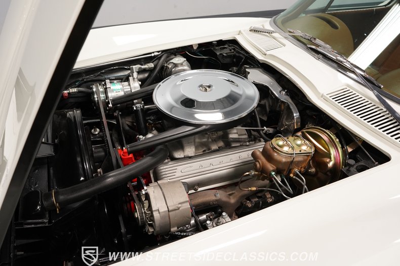 Unknown-Corvette-1964-Ermine-White-Saddle-1