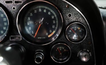 Unknown-Corvette-1966-Rally-Red-Black-17