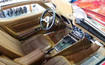 Unknown-Corvette-1969-torch-red-saddle